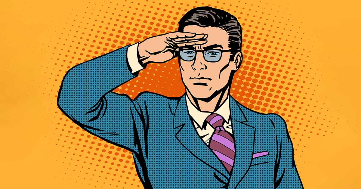 Ein Mann, wahrscheinlich ein Makler, der Ausschau nach Käufern hält