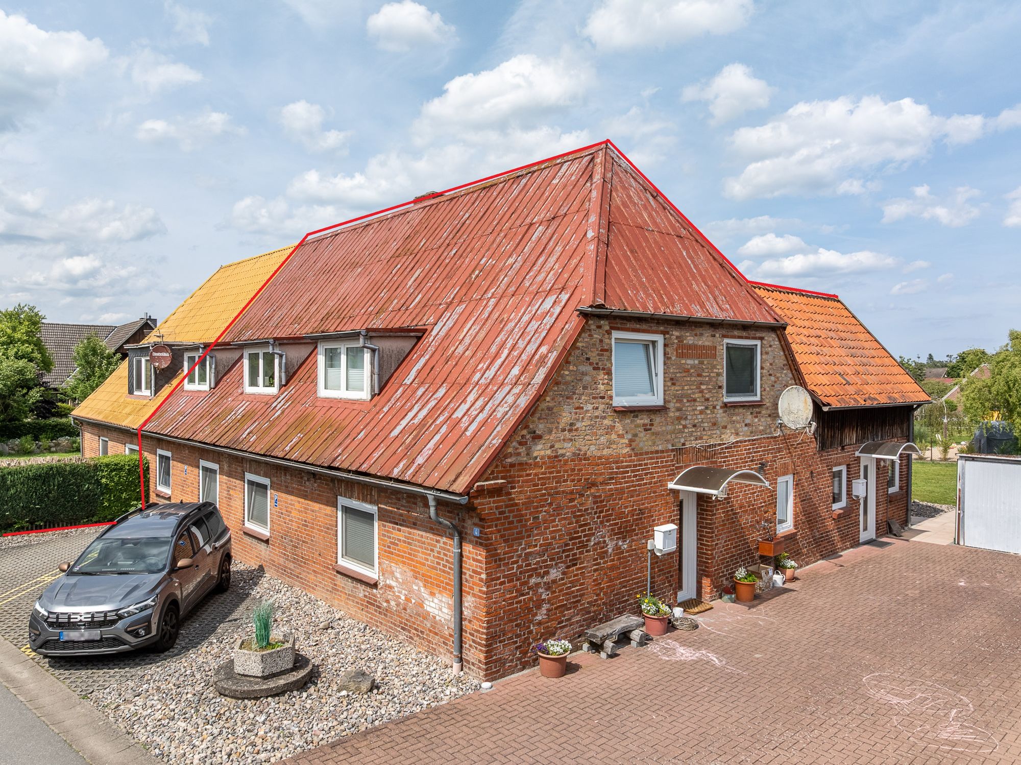 Blick auf das Haus - Für Kapitalanleger: Vermietete Mehrfamilien-Doppelhaushälfte in Blekendorf/Ostsee