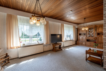 Wohnzimmer - Gepflegte Doppelhaushälfte auf sonnigem Grundstück in Malente/Kreuzfeld