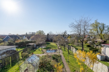 Blick in den Garten - Moderne 3-Zimmerwohnung inkl. Wintergarten in kleiner Anlage in Eutin zu mieten