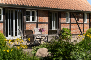 Blick auf die Terrasse - Historisches Fachwerkhaus mit zwei Wohnungen in Eutin-Fissau